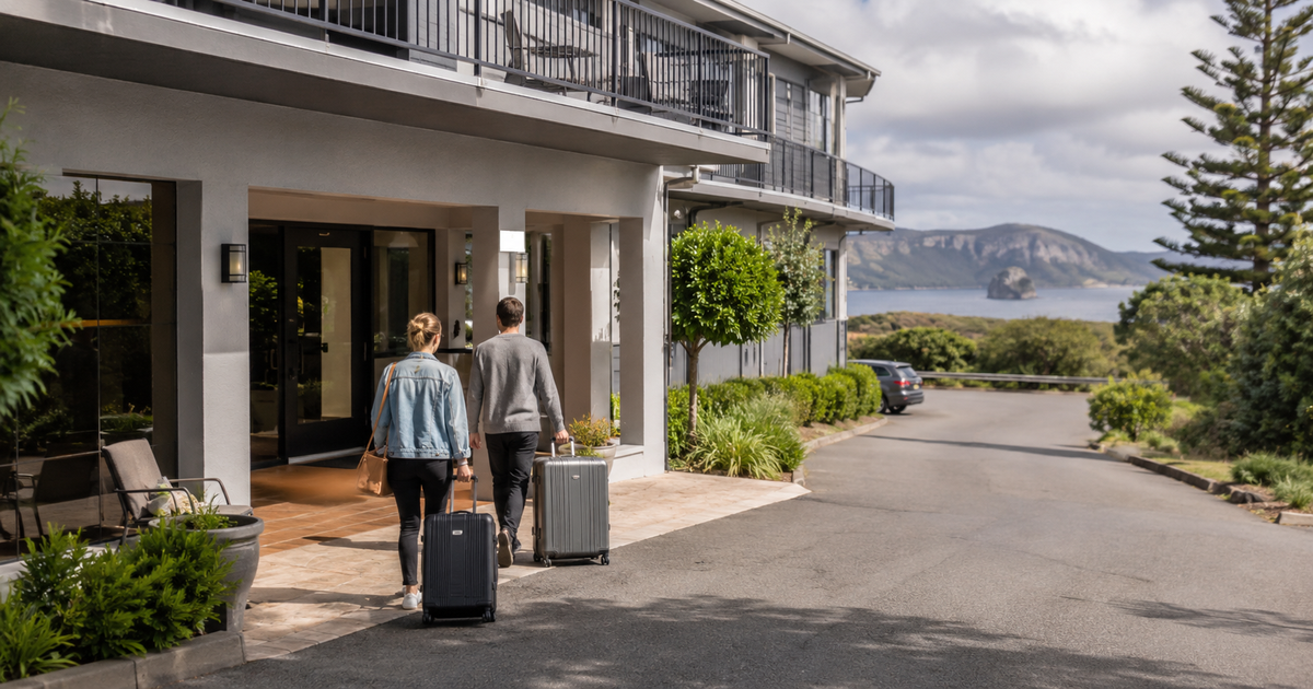 Travellers arriving at Albany accommodation with luggage